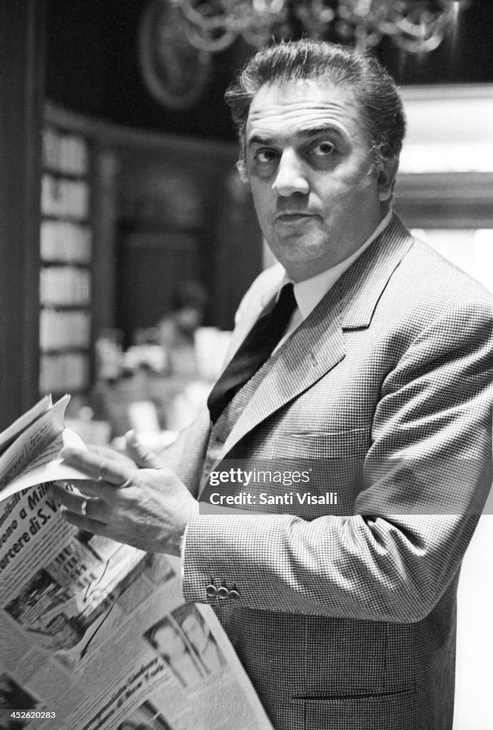 Movie Director Federico Fellini Reading A Newspaper