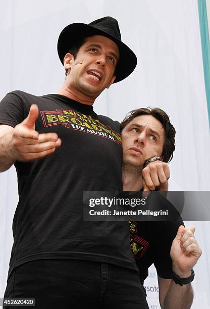 Nick Cordero and Zach Braff from the cast of "Bullets Over Broadway" perform during 106.7 LITE FM's Broadway in Bryant Park 2014 at Bryant Park on...