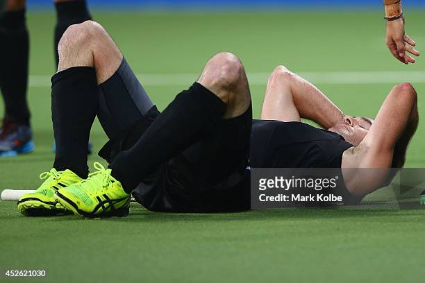 Phil Burrows of New Zealand reacts after a missed shot on goal during the Men's preliminary match between New Zealand and Canada at Glasgow National...