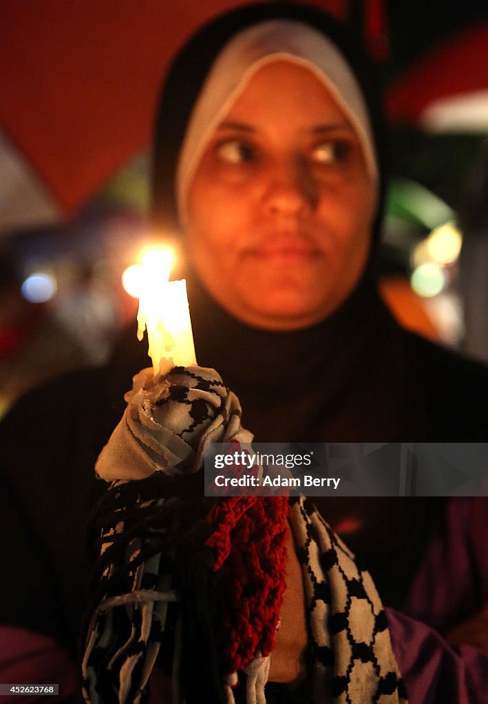 Demonstrators Hold Vigil For Palestinian Victims Of Gaza Attacks