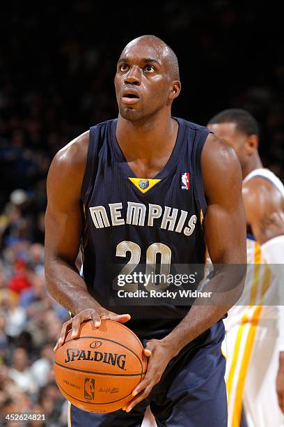 Quincy Pondexter of the Memphis Grizzlies shoots a free throw against the Golden State Warriors on November 20, 2013 at Oracle Arena in Oakland,...