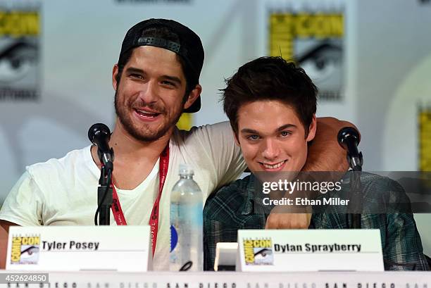 Actors Tyler Posey and Dylan Sprayberry attend MTV's "Teen Wolf" panel during Comic-Con International 2014 at the San Diego Convention Center on July...