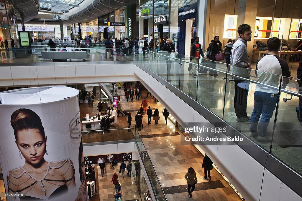People in the Westfield Stratford City shopping mall in...