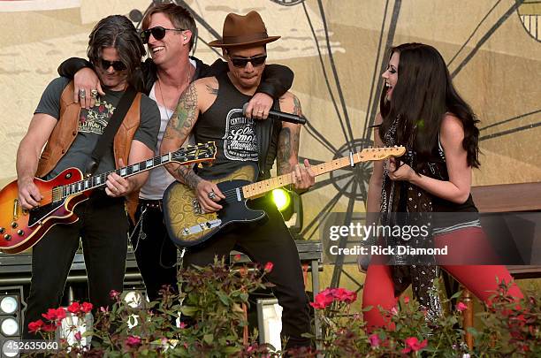 Keifer Thompson and Shawna Thompson of Thompson Square perform at Country Thunder USA - Day 1 on July 24, 2014 in Twin Lakes, Wisconsin.