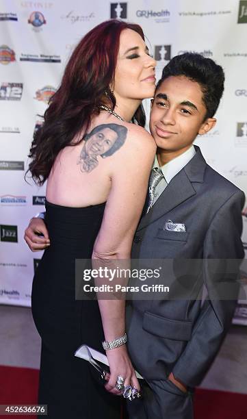 Tomi Rae Brown and James Brown II attends the Get On Up premiere at Regal 20 Cinemas on July 24, 2014 in Augusta, Georgia.