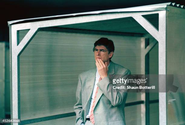 Arsenal manager Arsene Wenger looks on circa 1996.