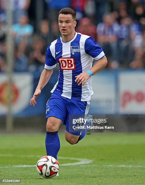 Alexander Baumjohann of Berlin runs with the ball during the pre season friendly match between Hertha BSC and PSV Eindhoven at Stadion am Wurfplatz...