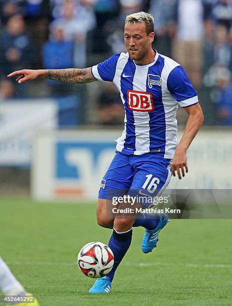 Julian Schieber of Berlin runs with the ball during the pre season friendly match between Hertha BSC and PSV Eindhoven at Stadion am Wurfplatz on...