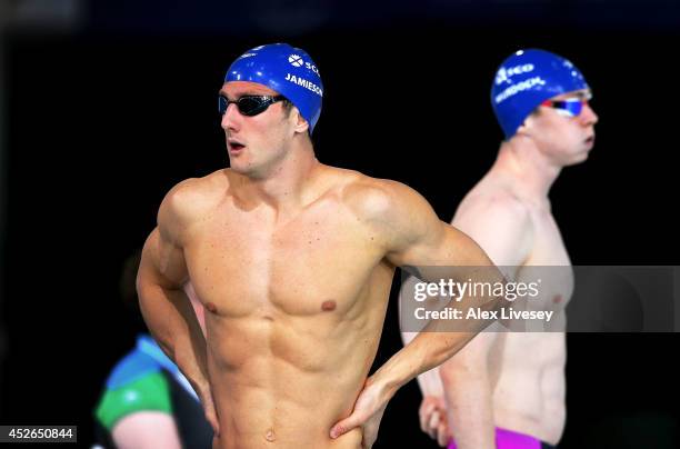 Michael Jamieson of Scotland looks on with Ross Murdoch of Scotland prior to the Men's 100m Breaststroke Heat 3 at Tollcross International Swimming...