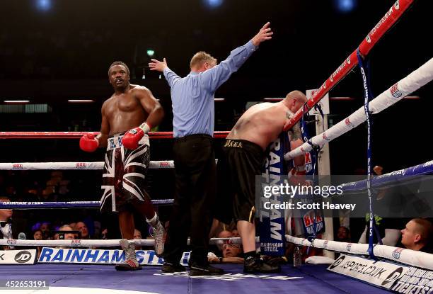 Dereck Chisora finishes Ondrej Pala during their WBO and Vacant International Heavyweight Championship bout at The Copper Box on November 30, 2013 in...