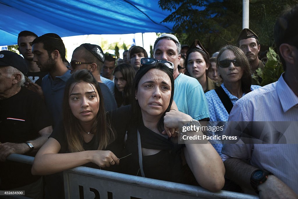 Mourners attend the funeral of Staff Sergeant Daniel...