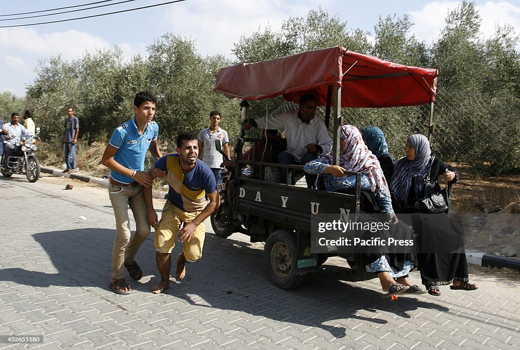 A Palestinian man grieves the loss of a relative after he...