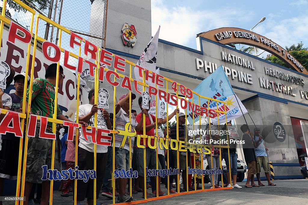 Members of human rights groups led by the "KARAPATAN", held...