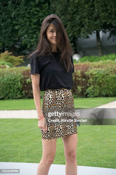 Stylist Barbara Martelo wearing a Saint Laurent skirt and vintage top day 2 of Paris Haute Couture Fashion Week Autumn/Winter 2014, on July 7, 2014...