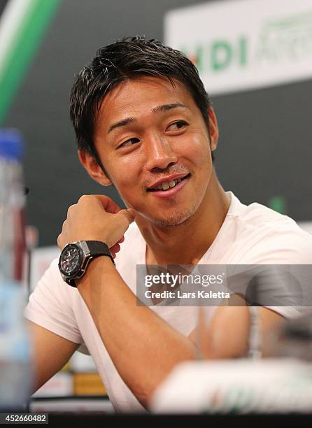 New signing Hiroshi Kiyotake is seen during a press conference at HDI Arena on July 25, 2014 in Hanover, Germany.
