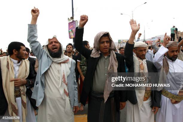 Yemenis shout slogans during a protest against the Israeli military offensive in the Gaza Strip and in solidarity with Palestinians on July 258, 2014...