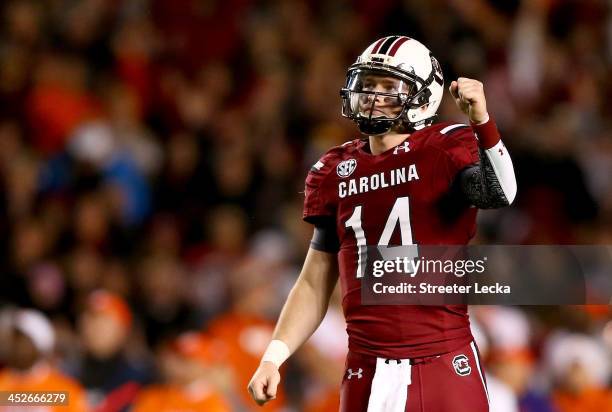 Connor Shaw of the South Carolina Gamecocks reacts after his team scores a touchdown during their game against the Clemson Tigers at Williams-Brice...