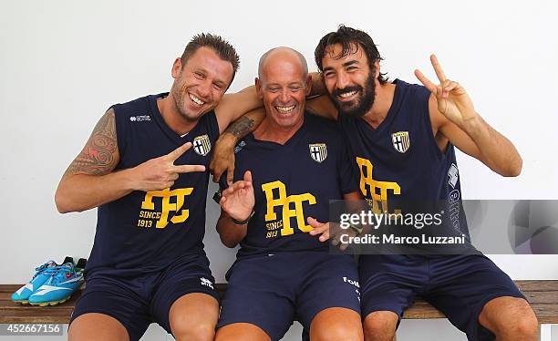 New signing Mattia Cassani , Roberto Pelacci and Antonio Cassano before FC Parma Training Session at the club's training ground on July 25, 2014 in...