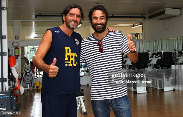 New signing Mattia Cassani and Parma FC captain Alessandro Lucarelli before FC Parma Training Session at the club's training ground on July 25, 2014...