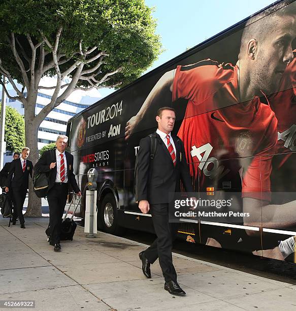 Wayne Rooney of Manchester United walks to the team bus as they prepare to leave Los Angeles as part of their pre-season tour of the United States on...