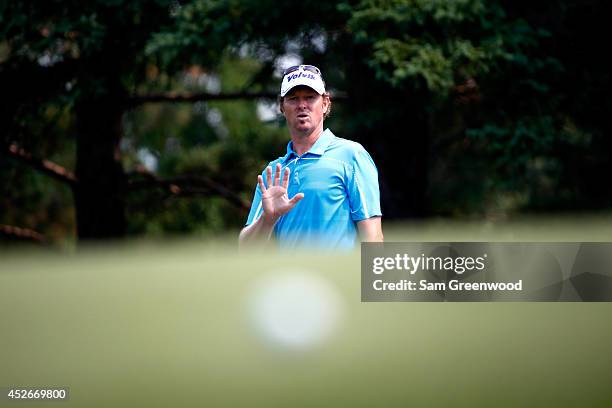 Tim Petrovic chips to the 18th green during the second round of the RBC Canadian Open at the Royal Montreal Golf Club on July 25, 2014 in Montreal,...