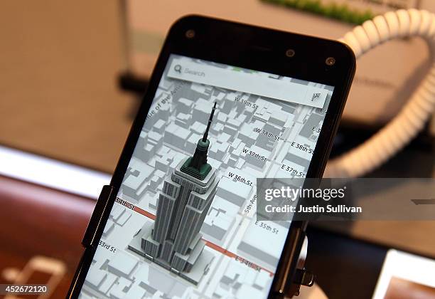 An image of the Empire State Building is displayed using Dynamic Perspective on the new Amazon Fire phone at an AT&T store on July 25, 2014 in San...