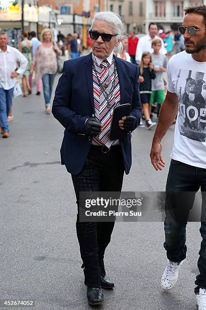 Saint-Tropez, FRANCE Karl Lagerfeld is seen in the port on July 25, 2014 in Saint, Tropez, France.