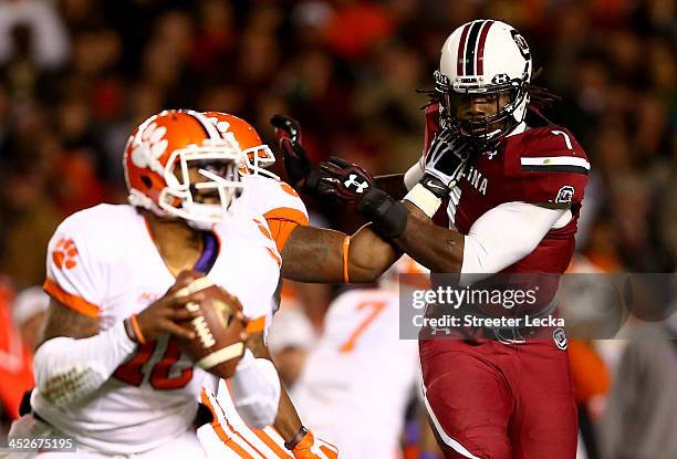 Jadeveon Clowney of the South Carolina Gamecocks goes after Tajh Boyd of the Clemson Tigers during their game at Williams-Brice Stadium on November...