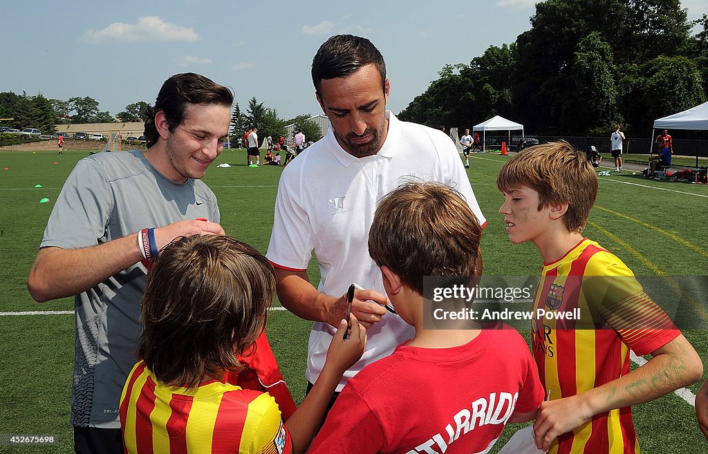 Liverpool FC Players Attend Soccer School