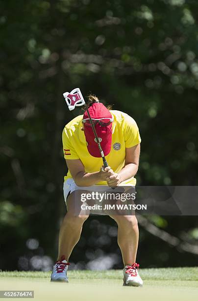 Spanish golfer Azahara Munoz reacts to a missed putt during the second round of the LGPA International Crown at Caves Valley Golf Club in Owings...