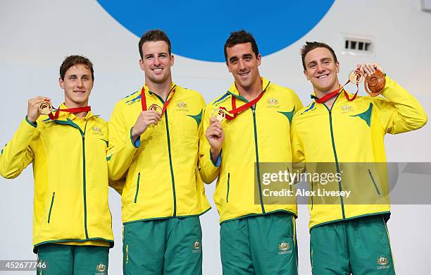 Cameron McEvoy, James Magnussen, Matt Abood and Tommaso D'Orsogna of Australia pose with their gold medals during the medal ceremony for the Men's 4...