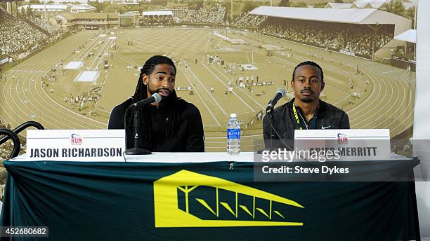 Track athletes Jason Richardson and Aries Merritt answer questions at a press conference during day four of the IAAF World Junior Championships at...