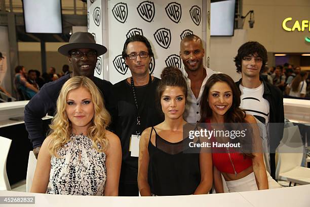 In this handout photo provided by Warner Bros, Isaiah Washington, executive producer Jason Rothenberg, series stars Ricky Whittle, Devon Bostick,...