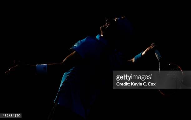 Thiemo De Bakker of the Netherlands serves to Benjamin Becker of Germany during the BB&T Atlanta Open at Atlantic Station on July 25, 2014 in...