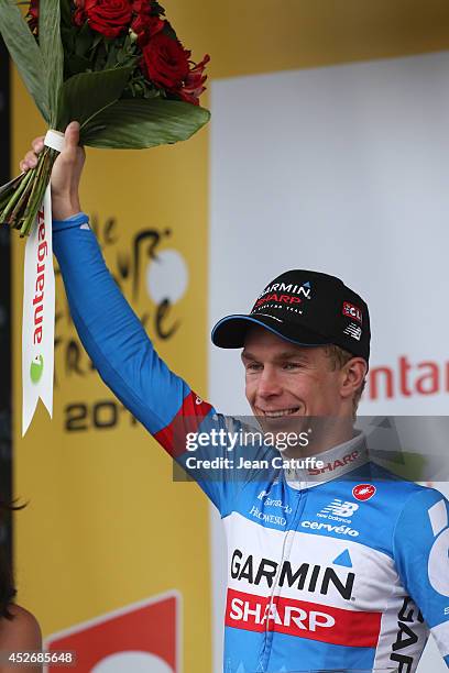 Tom Jelte Slagter of the Netherlands and Garmin-Sharp receives the best fighter of the day trophy after stage nineteen of the 2014 Tour de France, a...