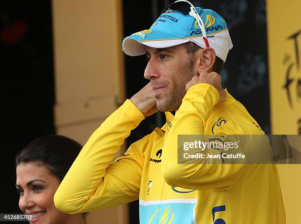 Vincenzo Nibali of Italy and Astana Pro Team retains the race leader's yellow jersey after winning stage nineteen of the 2014 Tour de France, a 208...