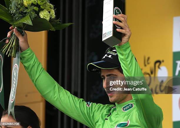 Peter Sagan of Slovakia and Cannondale retains the best sprinter's green jersey after stage nineteen of the 2014 Tour de France, a 208 km road stage...