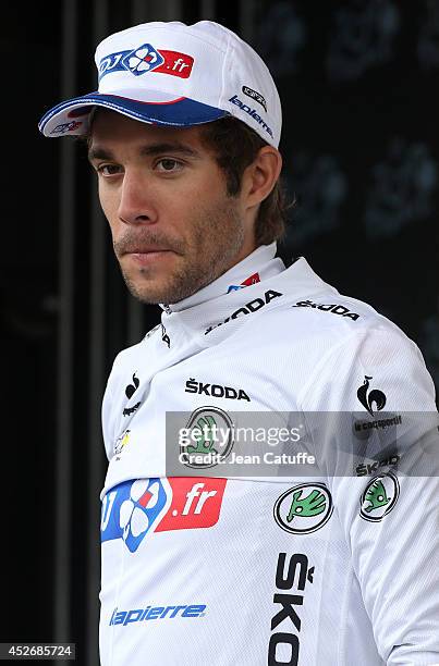 Thibaut Pinot of France and FDJ.fr retains the best young rider's white jersey after stage nineteen of the 2014 Tour de France, a 208 km road stage...