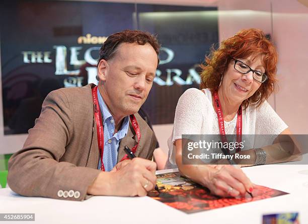 Actor John Michael Higgins and actress Mindy Sterling sign autographs at the Legend of Korra signing at the 2014 San Diego Comic-Con International -...