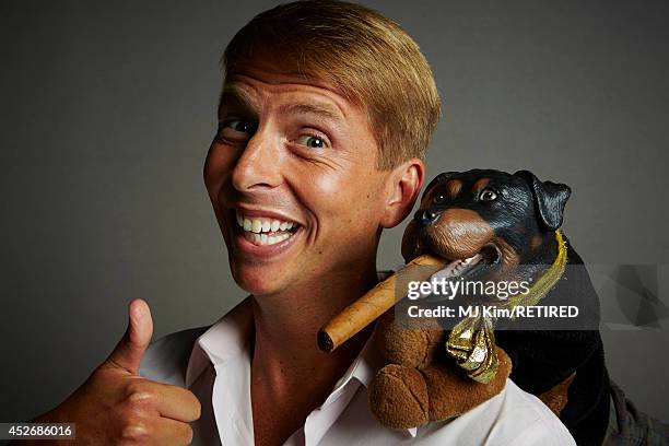Actor Jack McBrayer and Triumph the Insult Comic Dog pose for a portrait at the Getty Images Portrait Studio powered by Samsung Galaxy at Comic-Con...