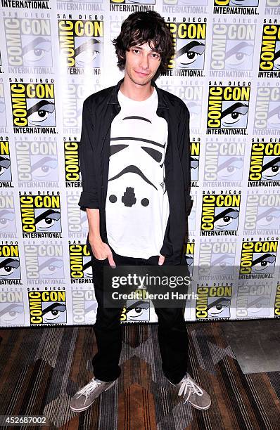 Actor Devon Bostick attends "The 100" Press Line during Comic-Con International 2014 at Hilton Bayfront on July 25, 2014 in San Diego, California.