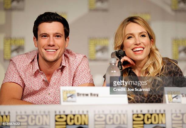 Actors Drew Roy and Sarah Carter speaks onstage at TNT at Comic-Con International: San Diego 2014 "Falling Skies" Panel at San Diego Convention...