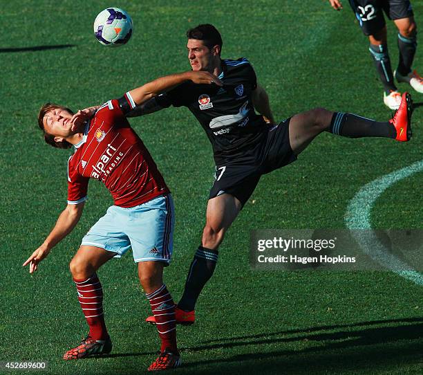 Mark Noble of West Ham United and Corey Gameiro of Sydney FC compete for a header during the Football United New Zealand Tour 2014 match between...