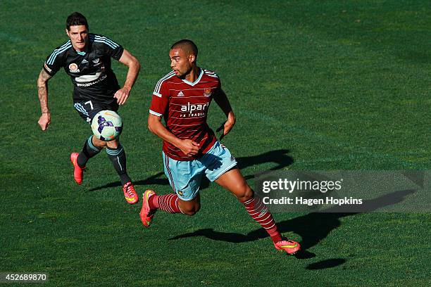 Winston Reid of West Ham United controls the ball under pressure from Corey Gameiro of Sydney FC during the Football United New Zealand Tour 2014...