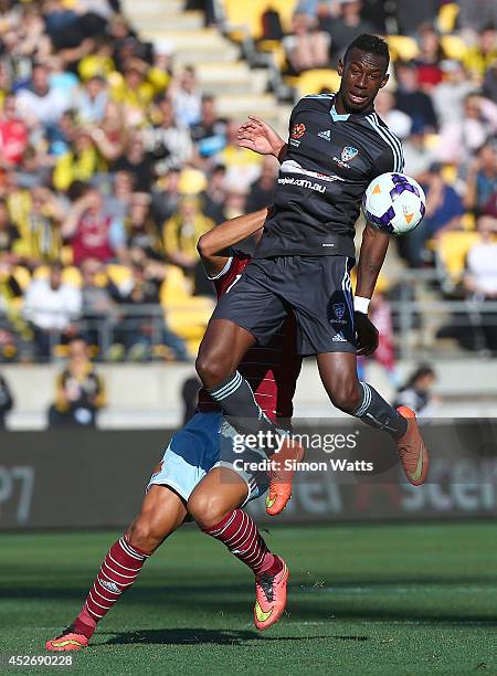 Bernie Ibini-Isei of Sydney FC looks to control the ball under pressure from Winston Reid of West Ham United during the Football United New Zealand...