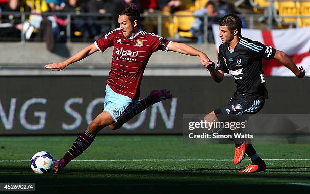 Stewart Downing of West Ham United shoots at goal during the Football United New Zealand Tour 2014 match between Sydney FC and West Ham United at...