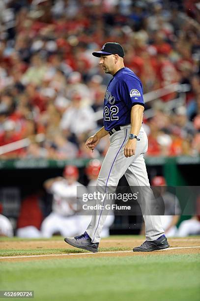 Manager Walt Weiss of the Colorado Rockies walks on the field during the game against the Washington Nationals at Nationals Park on June 30, 2014 in...