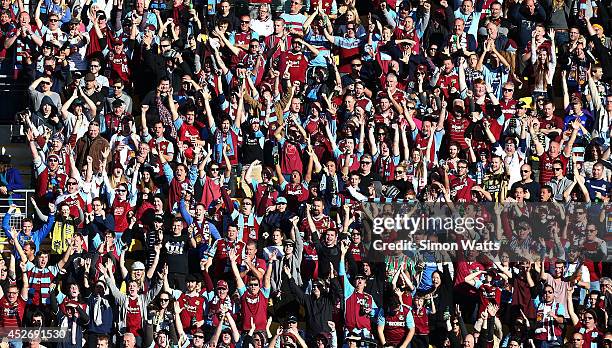 West Ham fans celebrate a goal during the Football United New Zealand Tour 2014 match between Sydney FC and West Ham United at Westpac Stadium on...