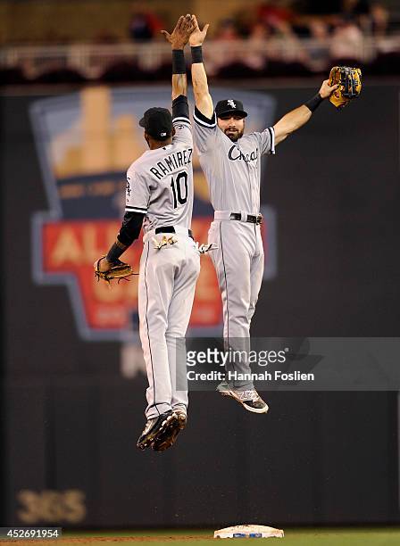 Alexei Ramirez and Adam Eaton of the Chicago White Sox celebrate a win of the game against the Minnesota Twins on July 25, 2014 at Target Field in...