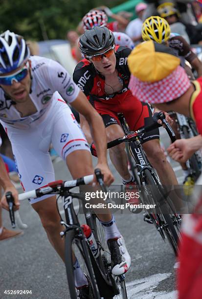 Tejay van Garderen of the United States and the BMC Racing Team follows Thibaut Pinot of France and FDJ.fr in the best young rider's white jersey on...